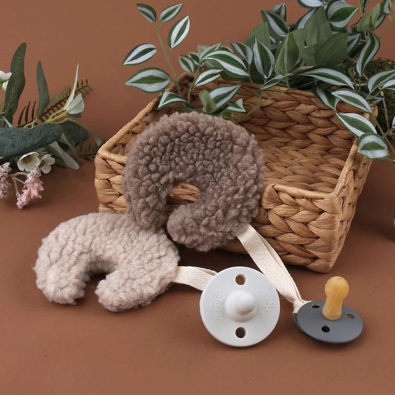 Plush moon pacifier holder